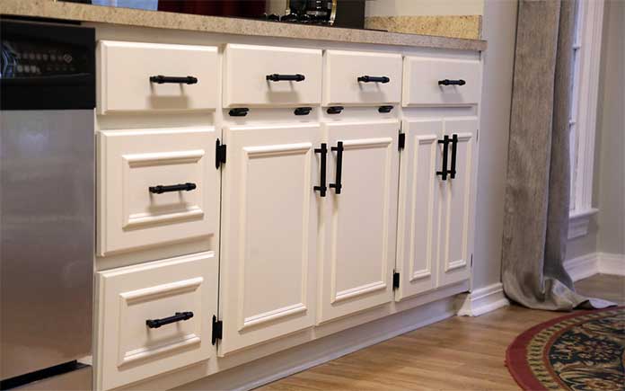 White painted cabinets with modern hardware