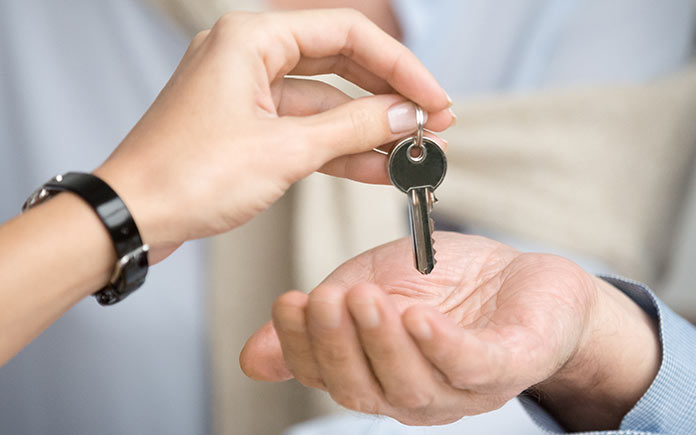 New homeowner receiving house keys