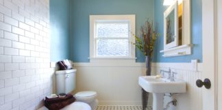 Eco-friendly bathroom with ceramic tile floors and blue walls