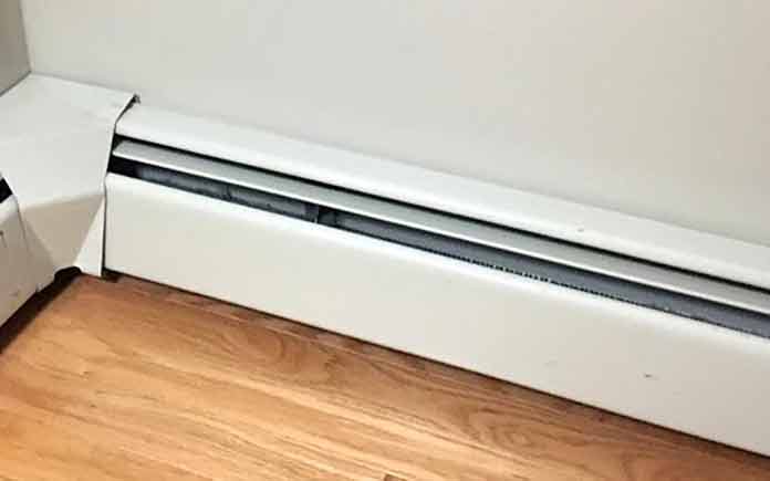 Baseboard Heater How To Improve The, Laminate Flooring Baseboard Heater