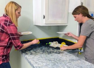 Chelsea Lipford Wolf and homeowner paint laminate countertop