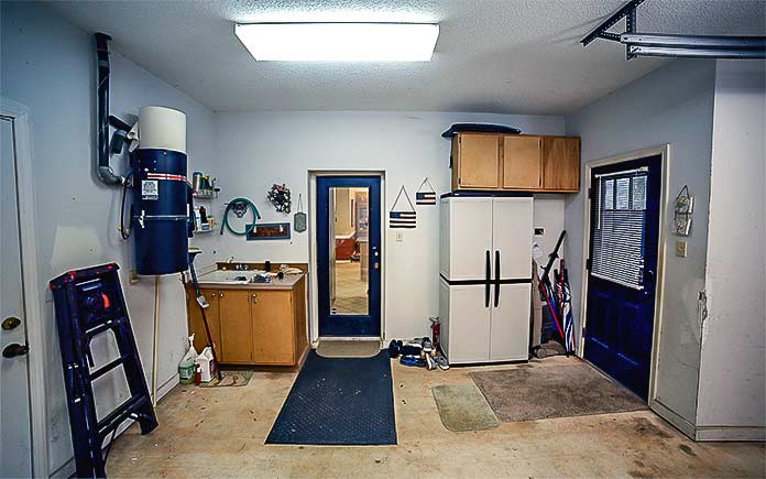 Mudroom, before renovation, showing the Hunters' messy garage