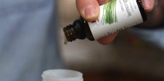Spray disinfectant being created from essential oils