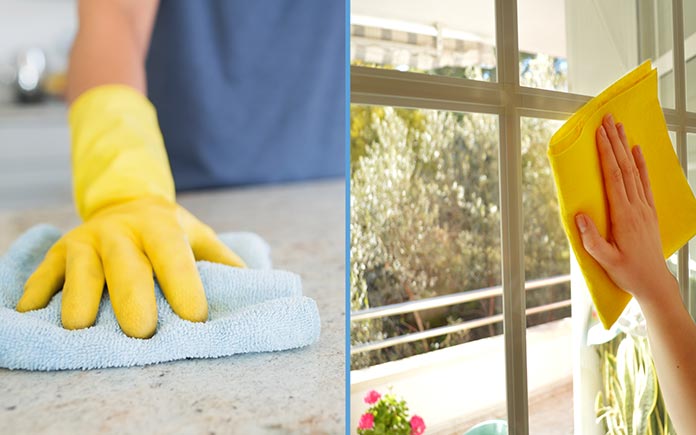 Gloved hands cleaning countertops and washing windows 