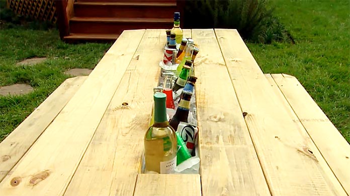 Picnic table with drink trough