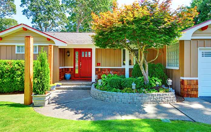 Wooden house with red door and nice front entry