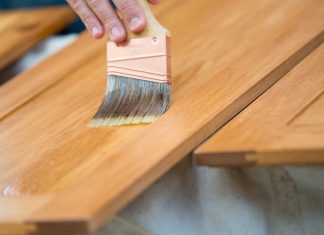 Staining kitchen cabinets with a paintbrush