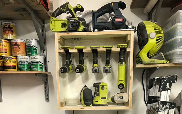 Ryobi power tools stored in one of Sabrina and Bill Gordon's wooden garage organization systems