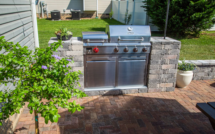 Backyard Paradise Features Paver Patio, How To Build A Grill Surround Using Pavers