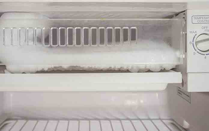 Freezer with ice buildup