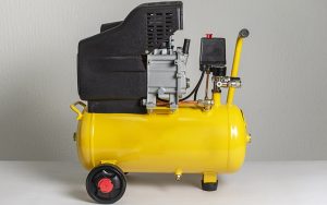 Yellow portable air compressor