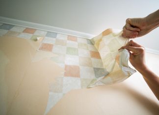 Closeup of wallpaper removal