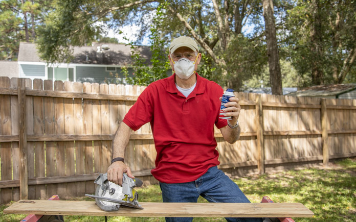 'Today's Homeowner' Simple Solution host Joe Truini wears a mask and safety glasses while working outside.