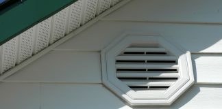 Closeup of a home with a gable vent and soffit vents