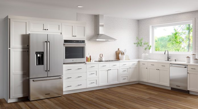 Remodeled modern kitchen, featuring Worthington White designs, as seen in a Cabinets To Go showroom.