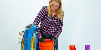 “Today’s Homeowner” host Chelsea Lipford Wolf mixes concrete on a table