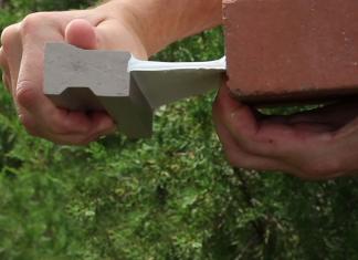 Titebond DuraMaster High Performance Sealant, seen sticking between a brick and a piece of molding