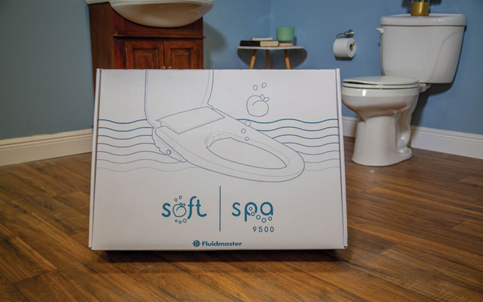 Fluidmaster Soft Spa box, unopened, in a bathroom