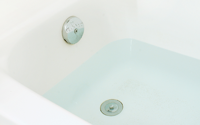 Bathtub slightly filled with water