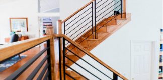 Staircase featuring linear metal panel system