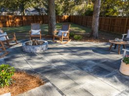 large paver patio with rocking chairs