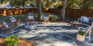 large paver patio with rocking chairs