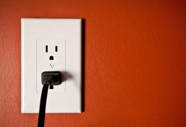 Cord plugged in electrical outlet