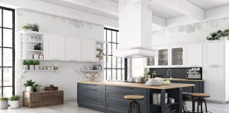 White nordic kitchen with dark grey cabinets and light wooden countertops