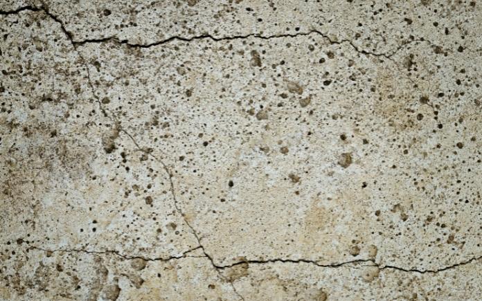 Close up view of a cracked concrete slab