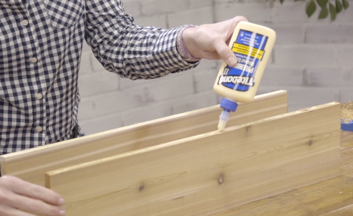 Applying Titebond wood glue to a board