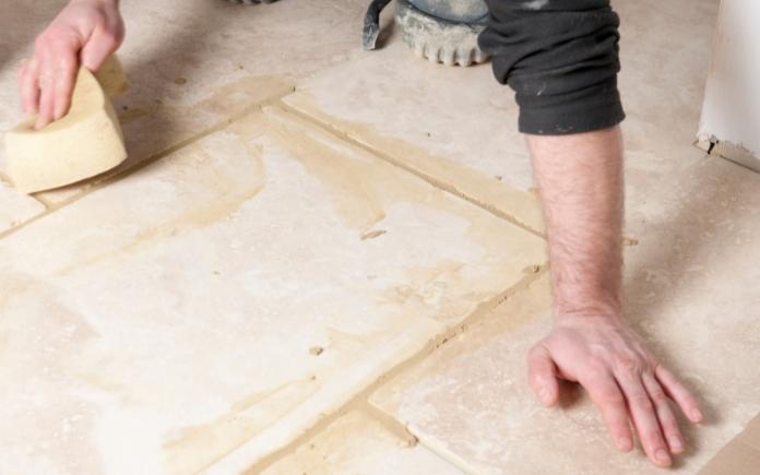 clean tile grout with grout sponge