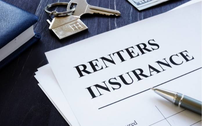 renter's insurance paper with pen and keys