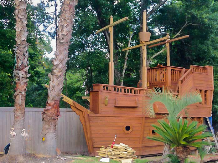 2017 photo of the freshly stained pirate ship playhouse