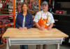 “Today’s Homeowner” Best New Products host Jodi Marks, pictured with a Husky Adjustable Height Workbench at The Home Depot with employee Dan Levinson, in Mobile, Alabama.