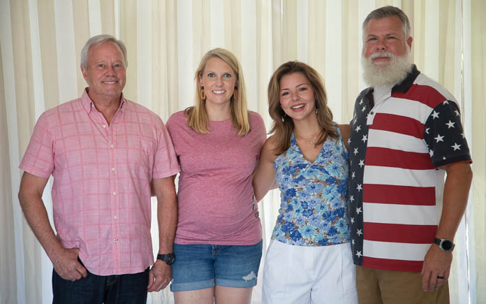 Today's Homeowner TV host Danny Lipford and co-host Chelsea Lipford Wolf pose with Delane Caldwell and her father, Tim Caldwell.