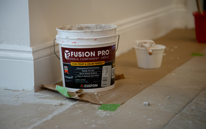 Custom Building Products Fusion Pro Grout bucket on tile during installation
