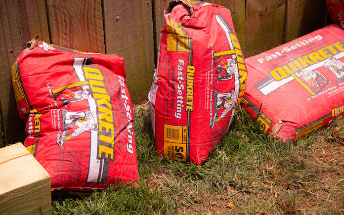 Quikrete fast-setting concrete in the red bag