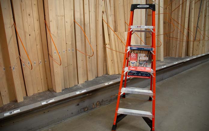 The Werner 6-ft. ladder in front of lumber stacks at The Home Depot