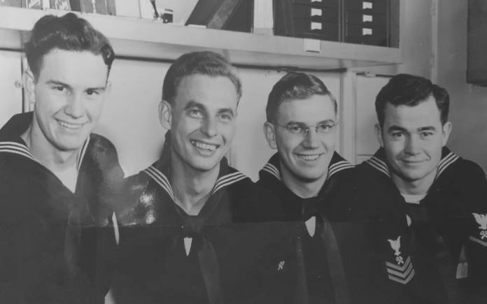 A photo of Rex O'Dell in his Navy uniform with his shipmates