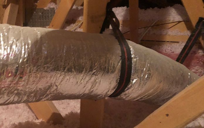 Air conditioning duct in attic
