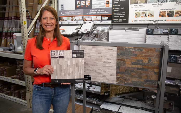 Best New Products Host Jodi Marks displays MSI Stik Peel and Stick backsplash at The Home Depot