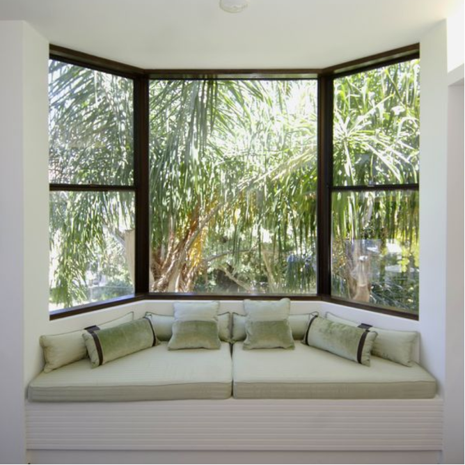 bay window with green cushions