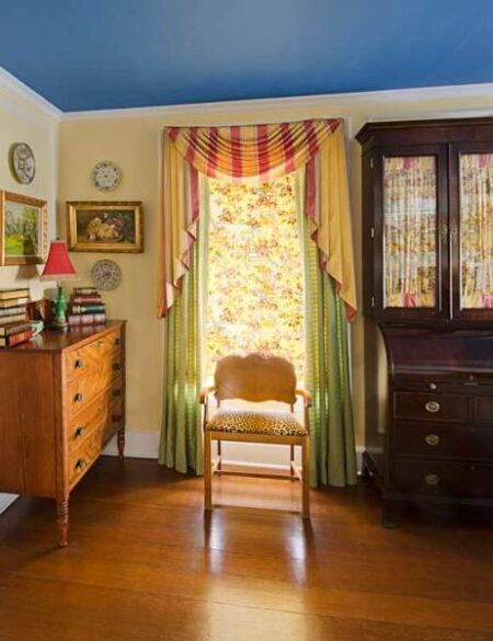the-master-bedroom-illustrates-the-owners-love-of-color-she-acted-as-interior-designer-during-restoration-of-the-house